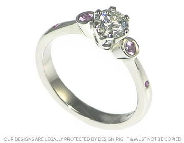 0.54ct h si diamond and pink sapphire platinum engagement ring