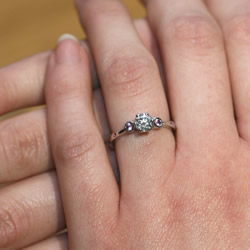 0.54ct h si diamond and pink sapphire platinum engagement ring