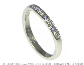 Beautiful and delicate palladium and amethyst wedding ring.