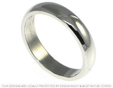 Palladium wedding band with engraved line detail adding to its uniqueness