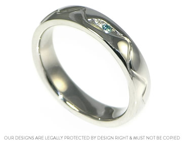 Michelle's mountain inspired palladium wedding ring