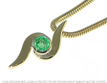 Curling pendant with customers own brilliant cut emerald 