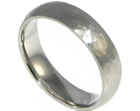 brian's palladium wedding ring with both a hammered and satinised finish