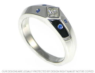 Paddy and Charity's bespoke apex style diamond and sapphire ring.