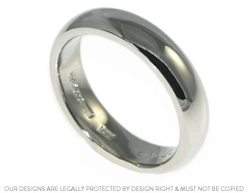 Palladium wedding ring with added engraved detail on the inside