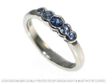 Bubble inspired platinum and blue sapphire engagement ring