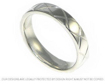 Engraved Sterling Silver wedding ring with a polished finish 