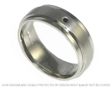 Phil's black diamond wedding ring with a satinised overlay