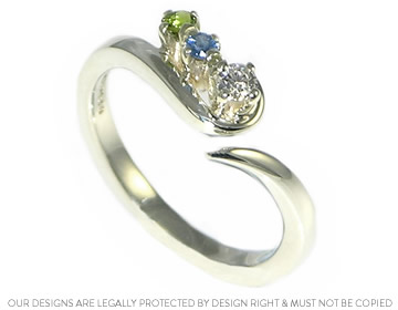 Naomi's twist style diamond, tourmaline and sapphire ring