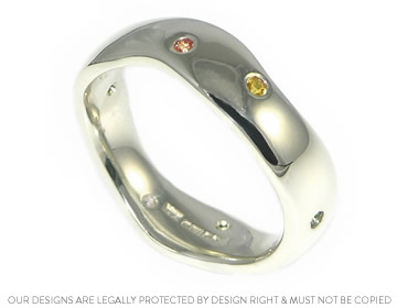 Nancy's wave wedding ring with beautiful coloured stones