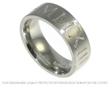 Lindsey's 7mm wide wedding band with Roman Numeral engraving