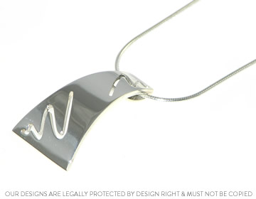 Lyn's pendant with an unusual cut out shape in the front