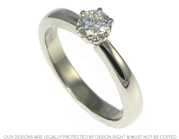 John wanted a traditional diamond solitaire engagement ring