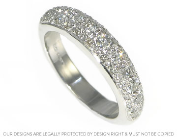 Tracey's striking wedding ring with pave set brilliant cut diamonds