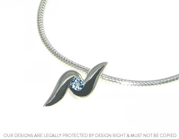 Claire's bespoke pendant with a beautiful aquamarine