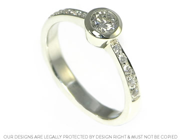 Classic delicate 9ct white gold diamond ring with pave shoulders