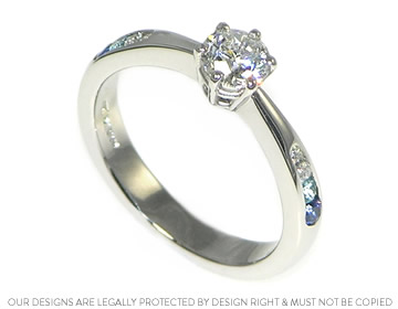 Claire's platinum diamond with channel set topaz engagement ring