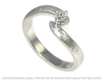 Unusual white gold lizzard engraved engagement ring