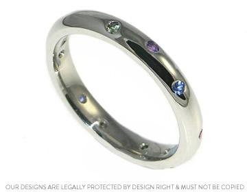 Adelle's palladium and sapphire scatter set eternity ring