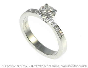 Classically inspired diamond and platinum engagement ring