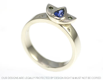 Anna's unusual Art deco engagement ring with a deep blue sapphire