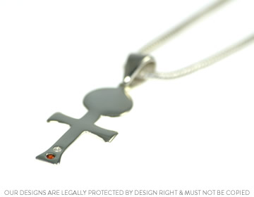 Silver St Albans cross pendant with ivisibly set diamond and garnet.