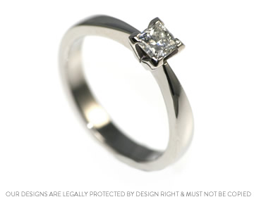 Palladium engagement ring with a princess cut diamond 