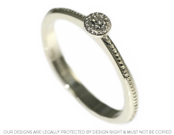 Delicate 9ct white gold and recycled diamond solitaire