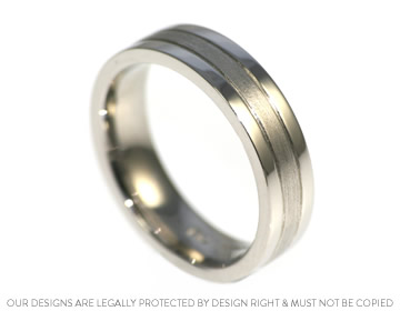 A contrasting finish wedding ring handcrafted in platinum