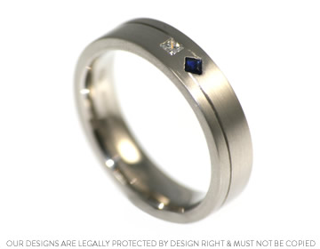 Palladium wedding ring with a 2mm princess cut sapphire and diamond