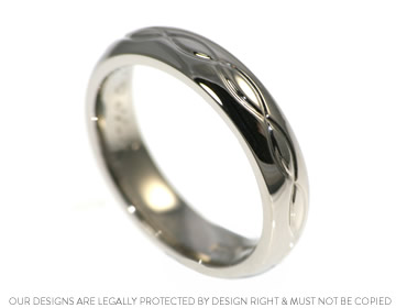 Mike's Celtic engraved wedding ring crafted in palladium