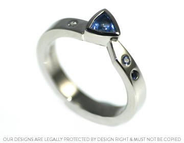 Nele's trilliant cut blue sapphire wedding ring