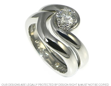 Nathalie's platinum wave style fitted wedding ring