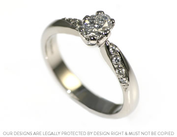 Stephanie's beautifully unique oval cut diamond engagement ring 