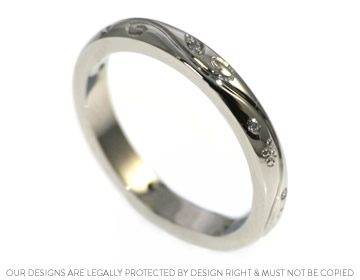 Megan's beautiful wedding ring with sparkly diamonds and engraving