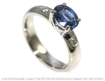 Palladium engagement ring with a stunning oval sapphire