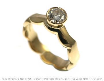 A dramatic 18ct yellow gold and diamond engagement ring