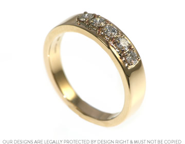 A dramatic 9ct yellow gold and diamond eternity ring