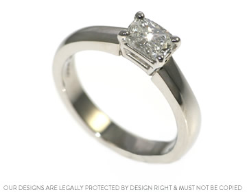 Tracy's cushion cut diamond and platinum engagement ring