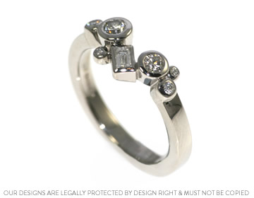 A contempory diamond and palladium cluster eternity ring