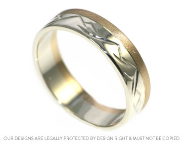 Karim's wedding ring with lake district inspired engraving