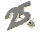 justin's handmade sterling silver pin to celebrate 25 years