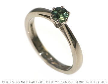 Gaby's stunning yet delicate green sapphire engagement ring