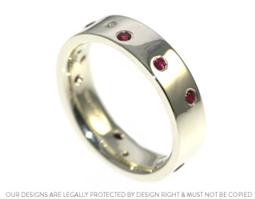 Carrie's beautiful ruby and diamond scatter set eternity ring