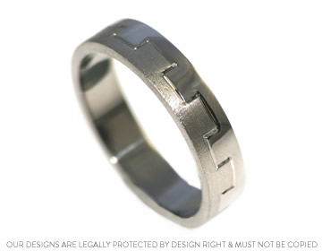 Nick's interlinking cog inspired wedding ring