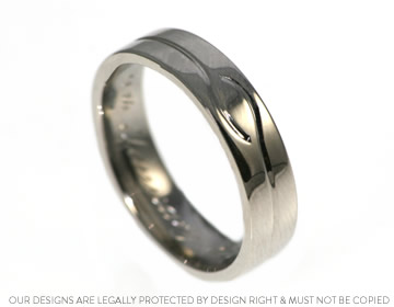 Guy's engraved wedding ring influenced buy his partner's ring