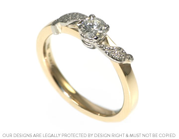 A personal yellow gold and palladium diamond solitaire engagement ring