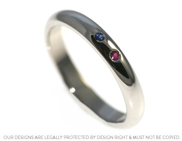 Delicate sapphire and ruby eternity ring to represent family