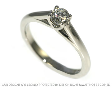 A platinum and diamond solitaire engagement ring for Megan