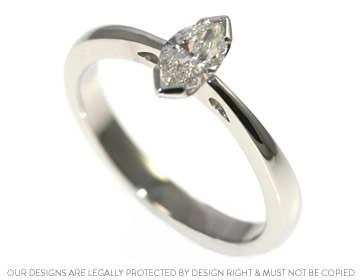 0.45ct H SI marquise cut diamond and platinum engagement ring